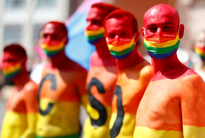 Revellers take part in the annual Gay Pride parade, also called Christopher Street Day (CSD), under restrictions due to the outbreak of the coronavirus disease (COVID-19) in Frankfurt, Germany, July 18, 2020. REUTERS/Kai Pfaffenbach TPX IMAGES OF THE DAY